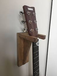 I decided to leave the hooks gray because the. Wooden Wall Mounted Guitar Stand Guitar Wall Hanger Guitar Hanger Wood Guitar Stand