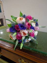 Bridal Bouquet Of Peach Garden Roses Hot Pink Roses Purple Lisianthus Pink Tulips White Veronica And Blue Thistle F Hot Pink Roses China Rose Pink Tulips