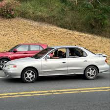Image result for Cardinal Red 1999 Elantra