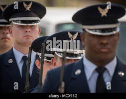 Team Eglin Honor Guard members prepare to present the colors during the  859th Special Operations Squadron change of command ceremony at Duke Field,  Florida, Jan. 9, 2021. Lt. Col. Brendon Bartholomew, 859