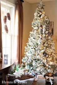 Poinsettia Paper Flowers An Easy Christmas Craft Christmas Tree Themes Holiday Tree Decorations Holiday Christmas Tree