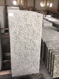 Kashmir white granite is a predominantly white stone with a bright appearance. White World Trade Grey White Granite Customised Tiles