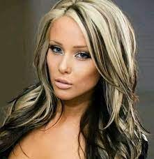 These soft toffee highlights look incredible against the brown hair. Bleach Blonde Hair With Brown Highlights Favorable Hair Color Highlights Trendy Hair Color Hair Looks
