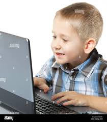 Little Kid Boy Playing On The Computer Laptop Technology Stock Photo Alamy