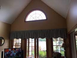 Well placed windows high above the floor towards the ridge of the ceiling permits sunlight into the upper portion of the cathedral ceiling. Vaulted Ceiling Window Treatments Help