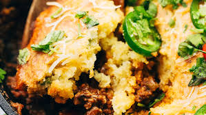 Refrigerated crescent dough is stuffed with corned beef hash, sautéed vegetables, scrambled eggs, and cheese, then baked until golden. 10 Cornbread Recipes That Show Off The Southern Side Dish