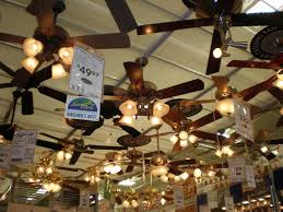 If the light is overhead, position a sturdy stepladder underneath the fixture. Do Energy Efficient Ceiling Fans Really Cut Costs