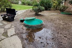 Build a septic drain field by digging trenches, adding gravel, laying perforated pipe, covering with more gravel and covering the trenches with the excavated soil. Septic System Parts And Common Issues Rob S Septic Tanks Inc