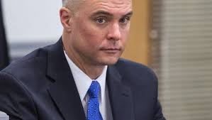 After Asheville police beating, city sues to fire captain