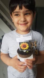 The Pre-school children have been planting sunflower seeds and learning  about how important bee's are. They even got to have some lovely honey