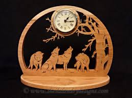 Are there any free printable scroll saw patterns? Howling Wolves Desk Clock Sheila Landry Designs