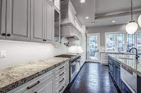 Check spelling or type a new query. Traditional Kitchen With White Lower Cabinets And Gray Upper Cabinets With Blackened Hickory Floor Gray And White Kitchen Upper Kitchen Cabinets Kitchen Design