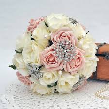 Whether you opt for an outdoor ceremony or indoor reception, you have the whole rainbow to choose from. Jewelled Bouquet Light Pink Cream Rosie Silk Flowers