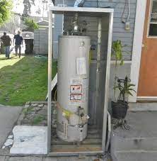 A water heater is one of important features that should be decorated in a house as it can supply the hot water for the member of family. Depiction Of Outdoor Water Heater Enclosure To Protect And Maintain Its Durability Water Heater Heater House Organisation