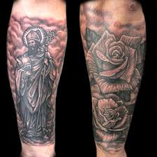Rose tattoos for men usually come in different designs each of which the wearer can relate the meaning. Religious Tattoos Done At Masterpiece Tattoo In San Francisco