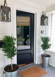 Farmhouse style house plans are timeless and remain popular today. 22 Trendy Farmhouse Exterior Lighting Planters Modern Farmhouse Exterior Modern Farmhouse Porch Farmhouse Style Decorating