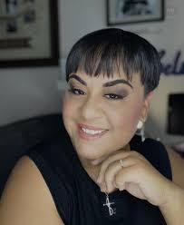 Who can recommend a stylist for a feminine pixie cut in Georgia?