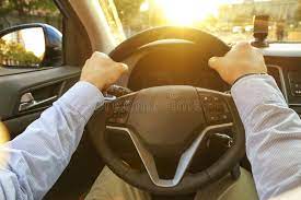 Car Interior with Male Driver Sitting Behind the Wheel, Soft Sunset Light.  Luxurious Vehicle Dashboard and Electronics. Stock Image - Image of change,  business: 116336727