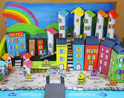 These fun activities and crafts for kids are easy, creative, and diy. How To Create A Recycled Rainbow Town With Kids