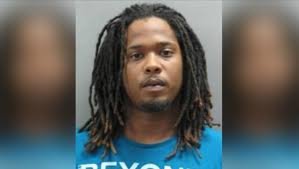 Man wanted for killing Harvey barber to Bears players turns himself in