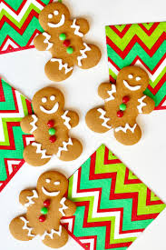 Another option is to make your own homemade royal icing and dye it the colors you'd like. Gingerbread Men Cookies The Bakermama