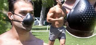 In 2015, asghari modeled in micheal costello's show. Is Britney Spears Boyfriend Wearing An Athletic Cup As A Mask