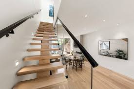 Gather stair railing ideas by browsing our extensive gallery of pictures. Timber Centre Carriage Stair With Black Steel Handrails And Glass Patch Fittings