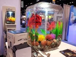 Artificial plants make a good substitute and silk plants are safer than plastic ones. Biorb Tanks