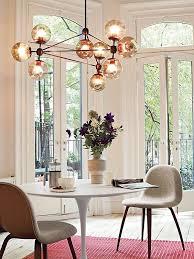Imposing Chandeliers That Aren T Just For Show Dining Room Inspiration Saarinen Dining Table Modern Dining Room