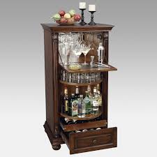 You delve into the highest level of craftsmanship and elegance for the home, just the environment you want to store and display your prized wines. Howard Miller Cognac Home Hide A Bar Bar Cabinet Wine Bar Cabinet Diy Home Bar