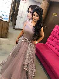 Pin By Megha On Honey Hairstyles For Gowns Indian Gowns Dresses Indian Wedding Gowns