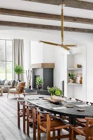 Not only is this piece made entirely of oak that's seasoned and kiln dried, it offers a. Brown Vintage Leather Chairs At Oval Black Oak Dining Table Transitional Dining Room
