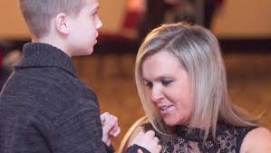 Tender moments at annual Mom-Son Dance