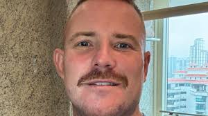 Political lobbyist Michael Kauter charged with breaching apprehended  domestic violence order involving husband David Gracey