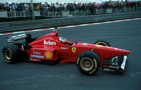 The ferrari f310, and its evolution, the f310b, were the formula one racing cars with which the ferrari team competed in the 1996 and 1997 seasons. 1996 Belgian Grand Prix Ferrari F310 Michael Schumacher Michael Schumacher Ferrari Ferrari Racing