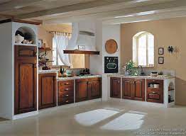 When it comes to aesthetics and versatility, white kitchen the classic raised panels of the cabinet doors and drawers are first element that gives this kitchen its traditional look. White Cabinets With Natural Wood Doors Novocom Top