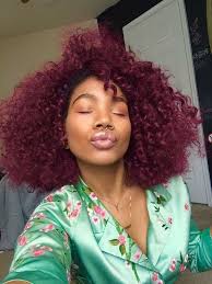 To complement warm undertones, opt for a burgundy with hints of true red. Burgundy Natural Hair On Dark Skin
