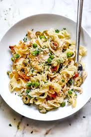 Tuna noodle is at heart an easy, thrifty casserole, with a base of tender egg noodles, savory gravy, sweet peas, and delicate flakes of tuna (bonus points if it has a crispy, cheesy top). The Best Tuna Noodle Casserole From Scratch Foodiecrush Com