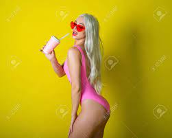 Blonde With A Beautiful Big Booty In A Pink Bathing Suit Drinks A Drink.  Girl In