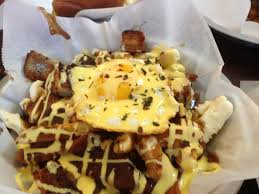 Cook gravy add cottage cheese and feta cheese when almost thick let sit. Badhappy S Frosted Flake Burger Extreme Poutine Bite Eat Swallow