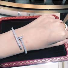 Put the two halves of your cartier love bracelet around your wrist. Cartier Nail Bracelet White Gold With Diamonds