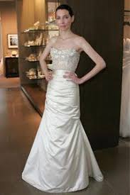 Nwd monique lhuillier bliss ivory faille satin & tulle wedding dress sz 12. Are Designer Wedding Gowns Worth The Cost Howstuffworks