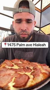 Discover Delicious Pizza at Pizzería 11 de Julio