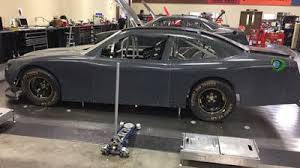 Sometimes in racing, extra laps are necessary to determine a winner. Nascar Race Mom New Body Means More Work For Jrm Teams Nascar Racing Teams Body