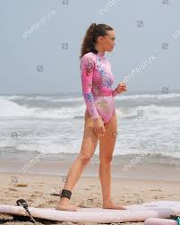 Reveal her buttocks and curves in these exclusive galleries