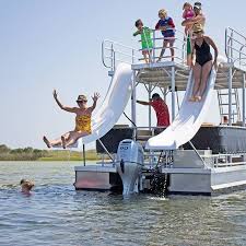 They have a secondary upper deck which has a slide attached, letting passengers slide into the water, or sunbathe on the top deck. Rent A Slide Boat On This Lake In Oklahoma For A Summer Adventure To Remember Panama City Panama Panama City Beach Boat Rental