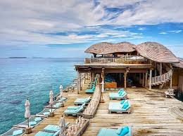 I Spent A Whole Day On One Of Those Blue Lounge Chairs Into The Blue At Soneva Fushi Discoversoneva Is Maldives Luxury Resorts Maldives Resort Luxury Resort