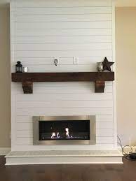 From cool shiplap decorating ideas to diy shiplap walls and more, here are the very best shiplap wall ideas we've seen. Shiplap Bioethanol Fireplace With Rustic Beam Mantle White Shiplap Wall Farmhouse Fireplace Ship Lap Walls