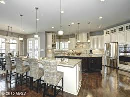 Spacious Kitchen With Two Islands Kitchens Kitchendesigns Homechanneltv Com With Images Kitchen Remodel Cost Double Island Kitchen Traditional Kitchen