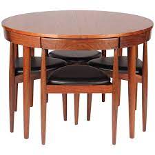Mid century modern dining chairs no modern dining table is complete without a set of stylish modern dining chairs. Scandinavian Modern Dining Table And Six Chairs Model Roundette By Frem Rojle For Sale At 1stdibs